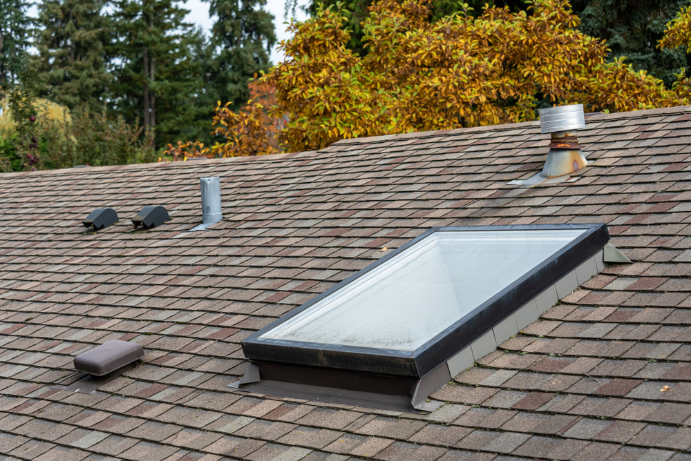 Rooftop,View,Of,Residential,Asphalt,Shingle,Roof,,Skylight,,Roof,Vents,